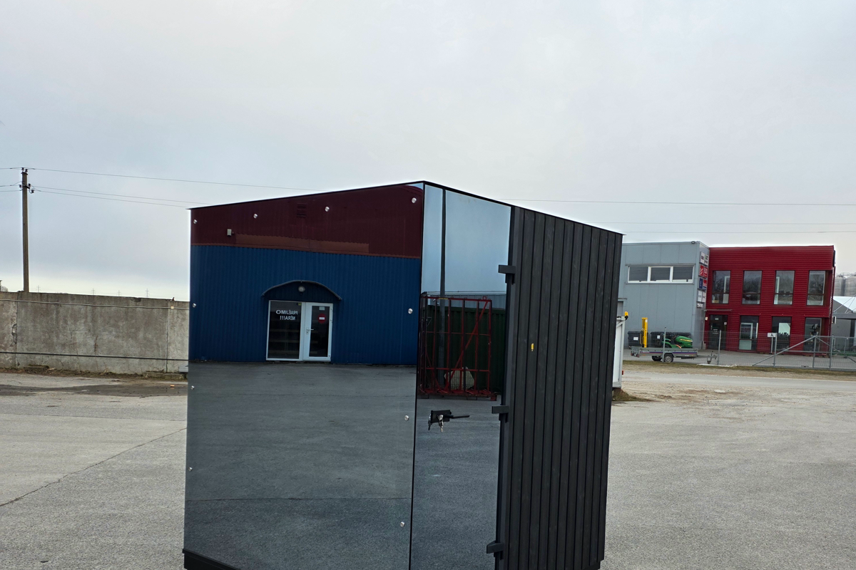 Finished modern cube sauna at the factory before its separate transport-packaging layer is added.